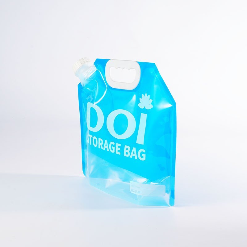 Finished stand-up spout pouch with corner fitment and handle