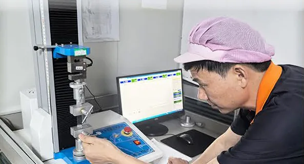 Technician carrying out packaging quality inspection